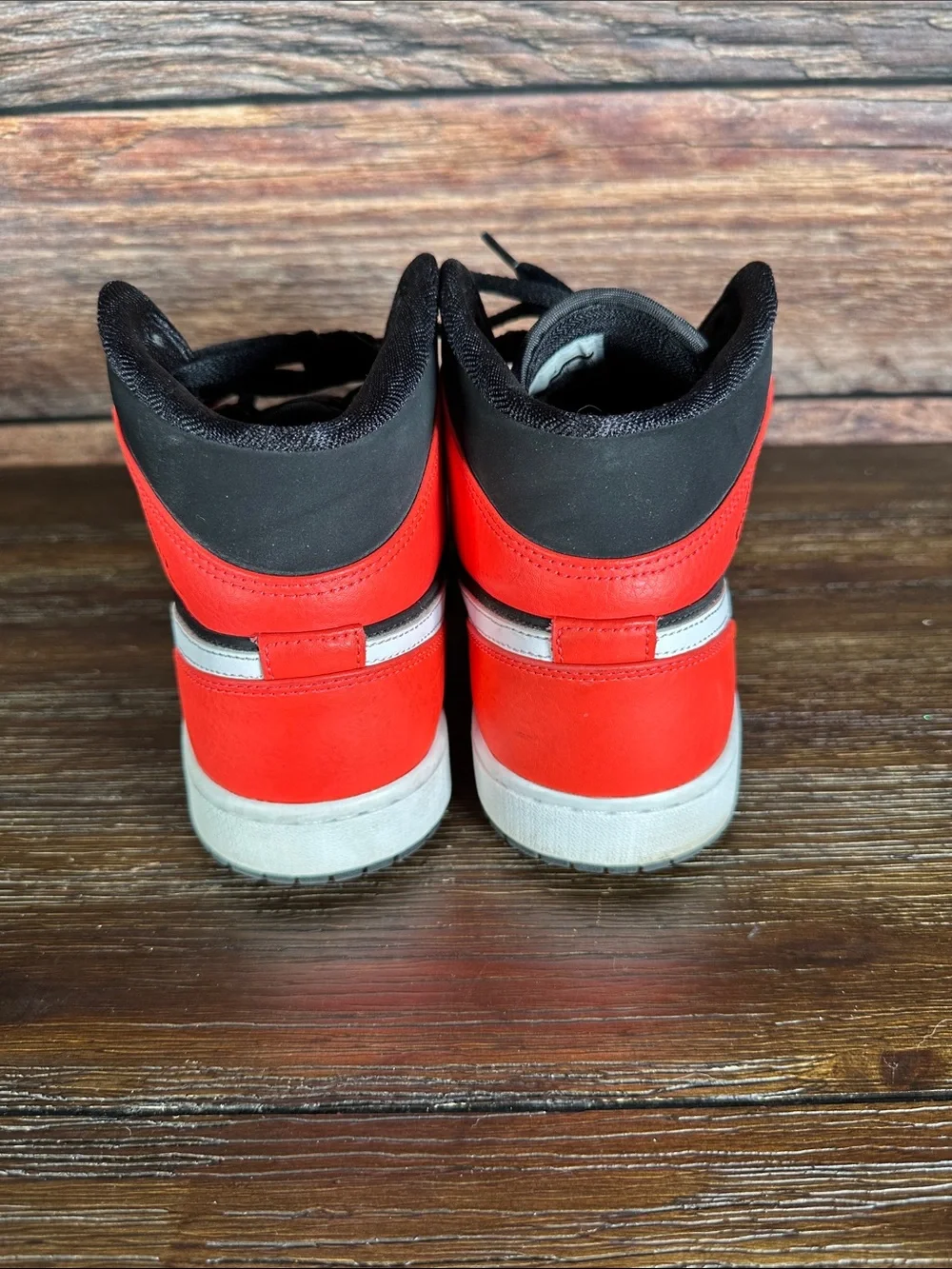 Nike Air Jordan 1 Mid Infrared 23 sneakers in Black and Neon Red
